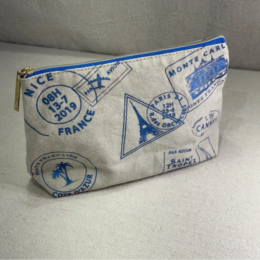 Lancôme Paris canvas cosmetic bag - blue passport stamp design